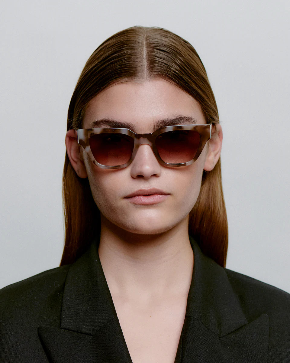 Kaws Sunglasses - Cookie Dough